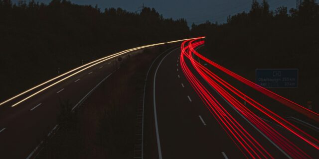 Overexposed image of a highway at night